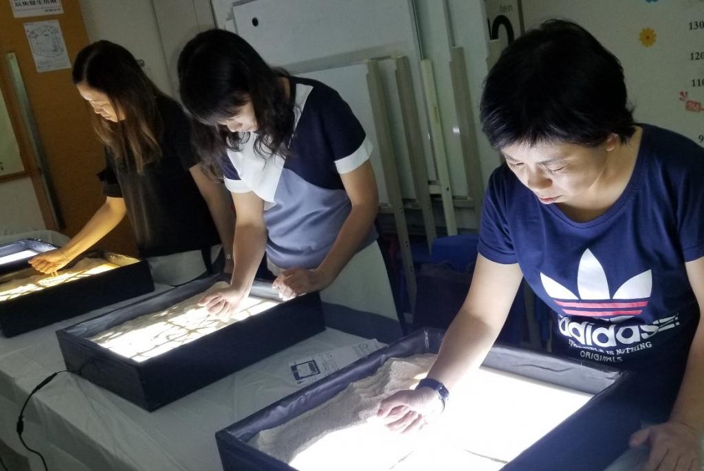 Sandpainting workshops helped women cope with marital adversity