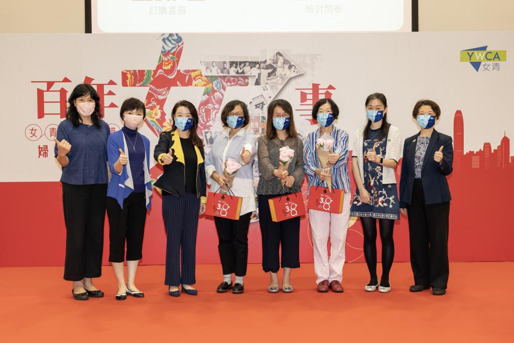 Eight women take photo in front of the backdrop of “A Hundred Years of Good Deeds” sharing session