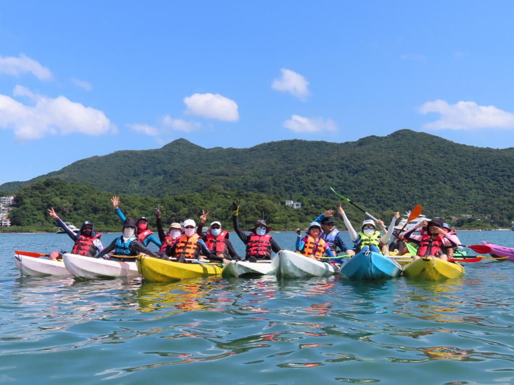 a group of elderly taking part in canoeing experience 