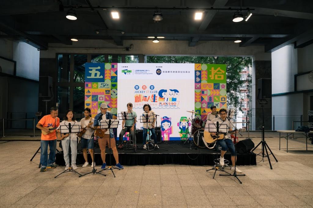 Band stage performance by a group of elderly