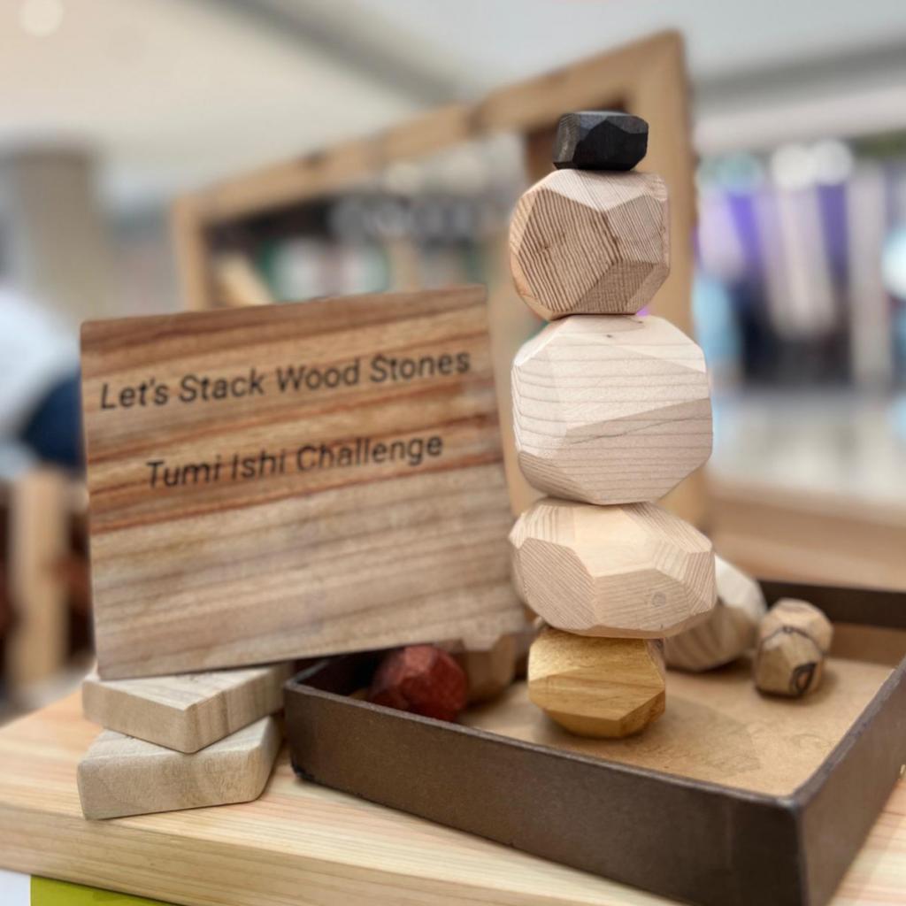 A wooden decoration made of 50% recycling wood. 