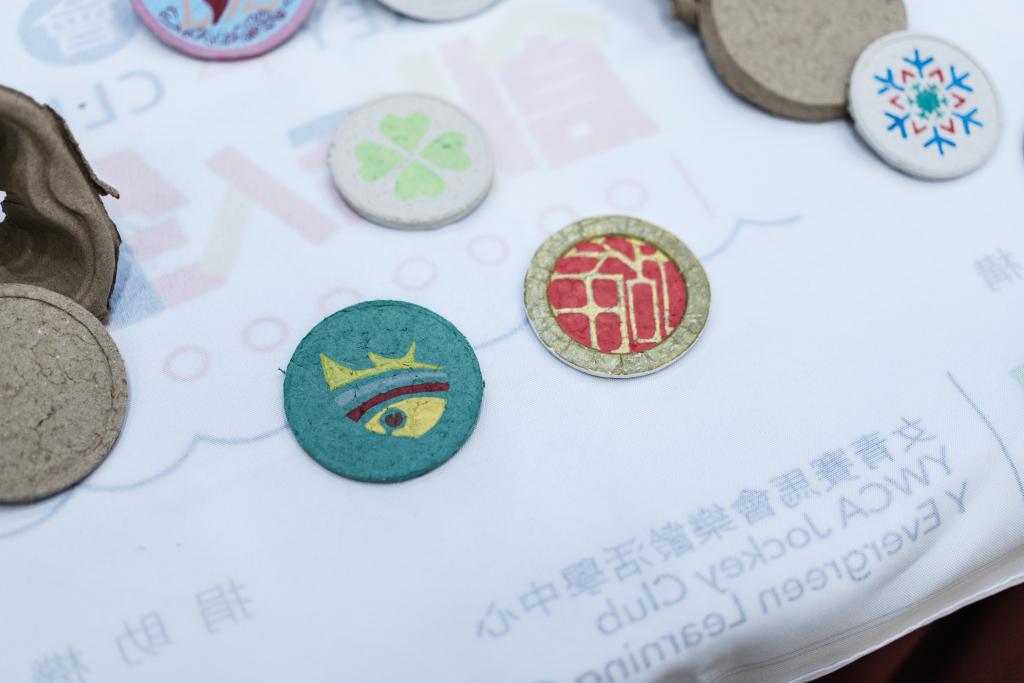 Volunteers upcycled papers into coasters and gave a new life to used papers. 