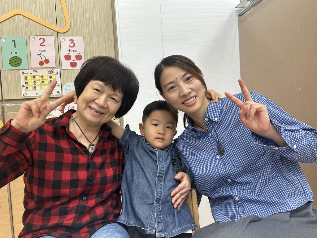 Three generation wore handmade resin ornaments, symbolising the deep emotional connection.