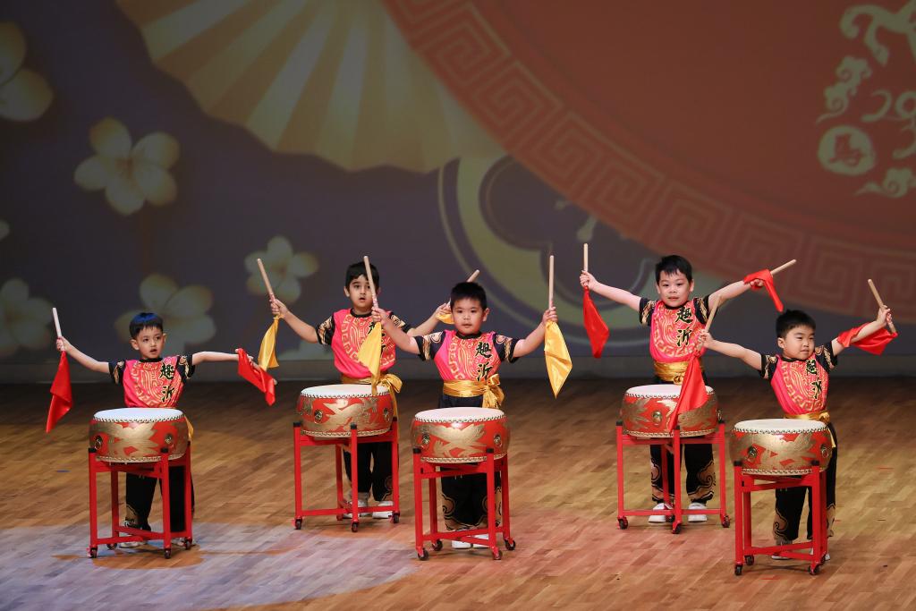 With their small frames, they played the drums with such passion and energy, adding a powerful momentum to the grand performance.